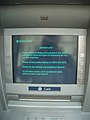 "Tamper_warning_on_ATM_in_London.jpg" by User:PrimroseGuy